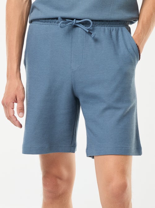 Sportshort met zakken en fantasiepatroontje - Kiabi