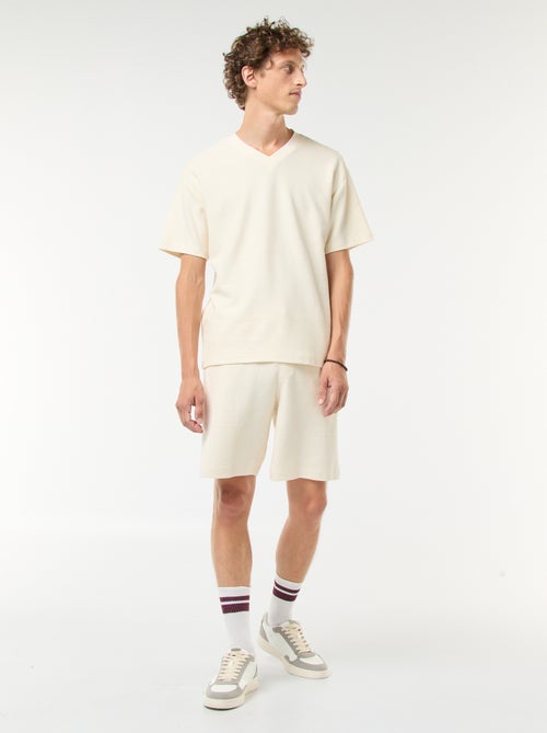 Sportshort met zakken en fantasiepatroontje - Kiabi