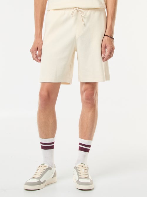 Sportshort met zakken en fantasiepatroontje - Kiabi