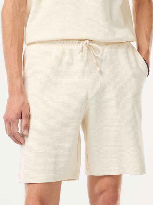 Sportshort met zakken en fantasiepatroontje - Kiabi