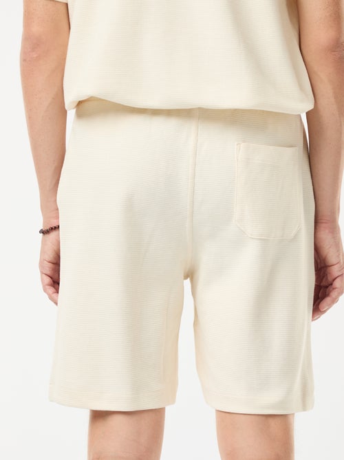 Sportshort met zakken en fantasiepatroontje - Kiabi