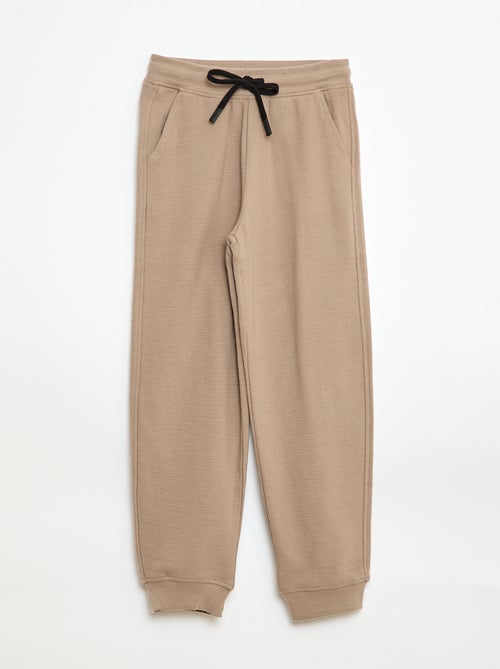 Sporttraining in effen, lichte joggingstof - Kiabi