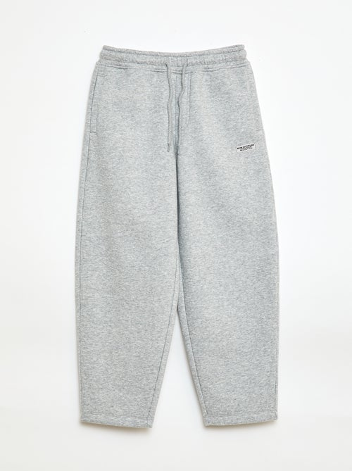 Sporttraining in ruimvallende joggingstof - Kiabi