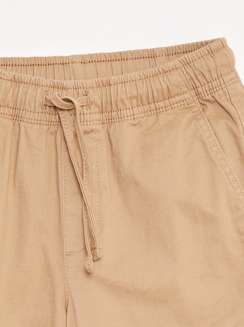 Stretchbroek met zakken Biege - Kiabi