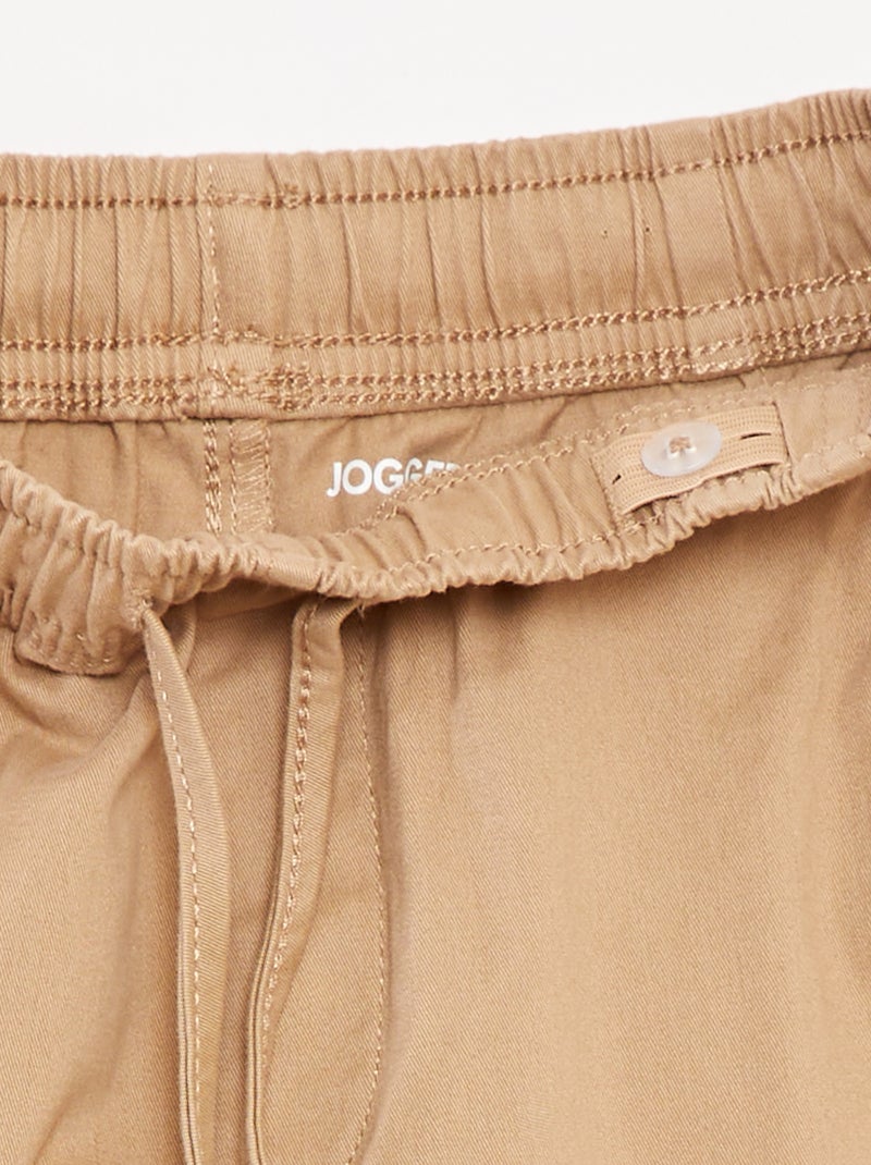 Stretchbroek met zakken Biege - Kiabi