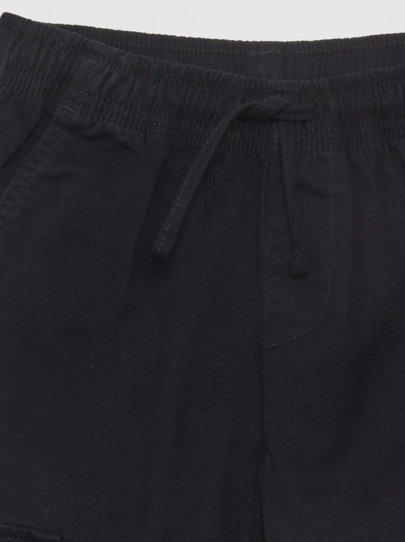 Stretchbroek met zakken zwart - Kiabi