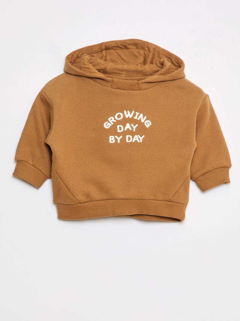 Sweater met capuchon van lichte joggingstof met origineel detail op het voorpand Biege - Kiabi