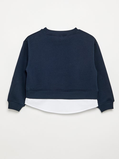 Sweater met geïntegreerde hemdonderkant en borstborduurwerk - Kiabi Sweater met geïntegreerde hemdonderkant en borstborduurwerk - Kiabi