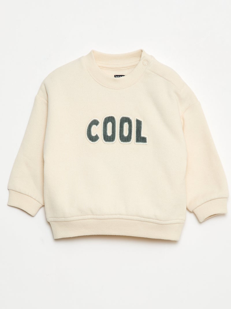 Sweater van geruwde joggingstof met borduursel 'cool' Biege - Kiabi