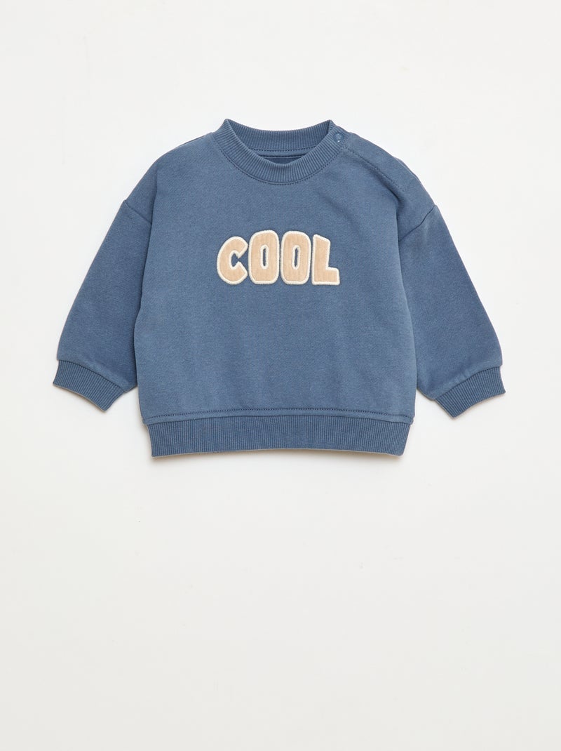 Sweater van geruwde joggingstof met borduursel 'cool' Blauw - Kiabi