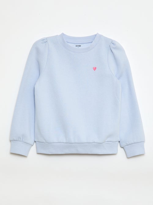 Sweater van joggingstof met borduursel en fronsjes op de schouder - Kiabi Sweater van joggingstof met borduursel en fronsjes op de schouder - Kiabi