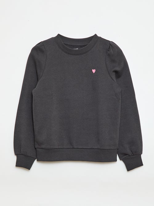 Sweater van joggingstof met borduursel en fronsjes op de schouder - Kiabi Sweater van joggingstof met borduursel en fronsjes op de schouder - Kiabi