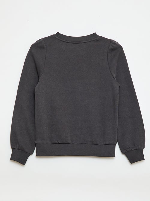 Sweater van joggingstof met borduursel en fronsjes op de schouder - Kiabi Sweater van joggingstof met borduursel en fronsjes op de schouder - Kiabi