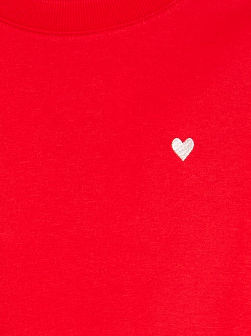 Sweater van joggingstof met borduursel en fronsjes op de schouder - Kiabi