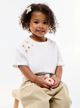 T-shirt met korte mouwen en bloemen op de schouder