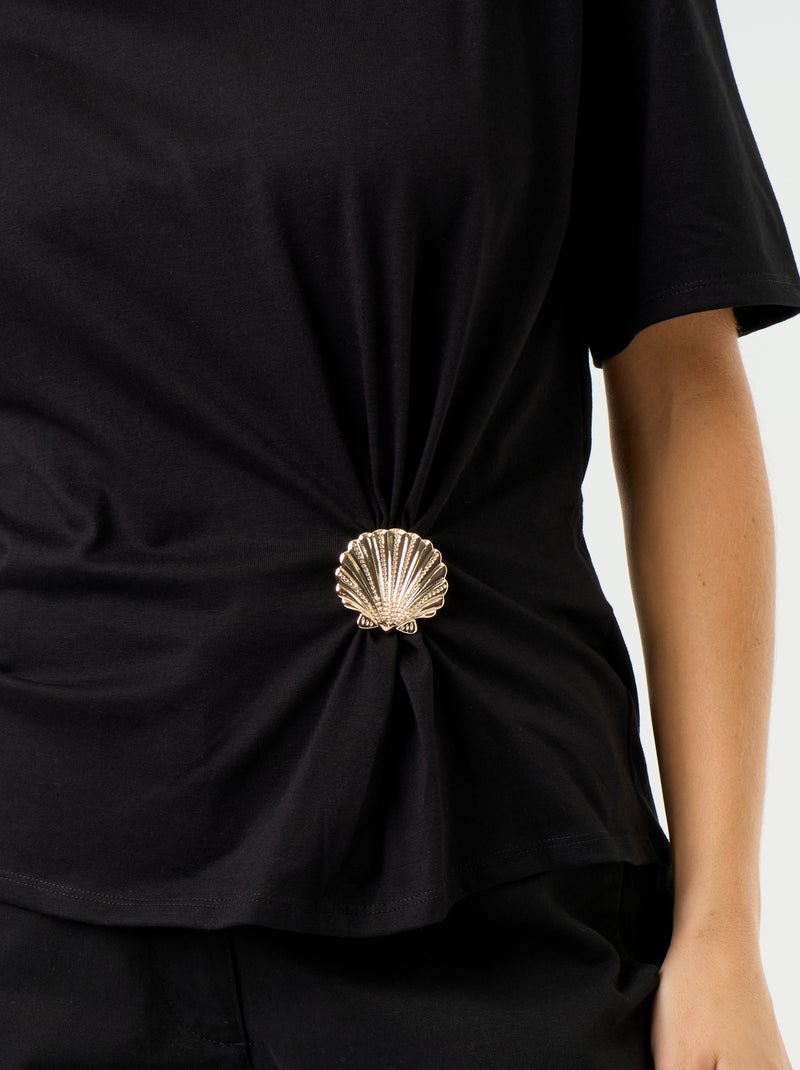T-shirt met korte mouwen en goudkleurige schelp Zwart - Kiabi