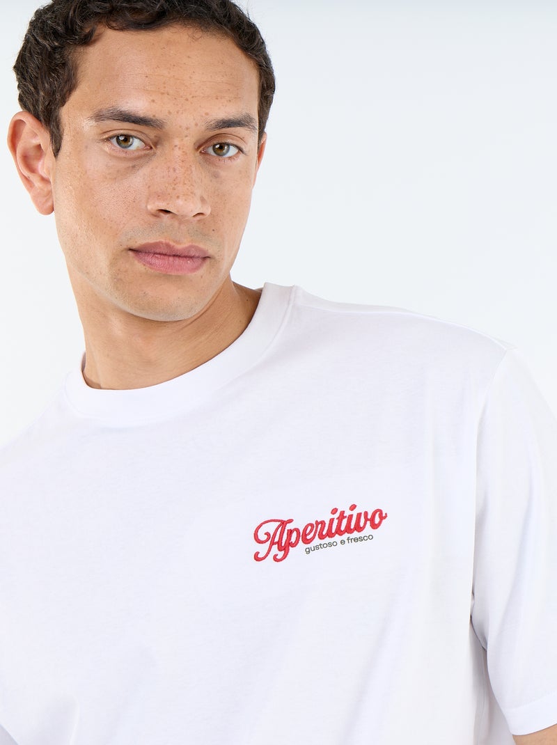 T-shirt met korte mouwen met prints en borduursels op voor- en achterkant Wit - Kiabi
