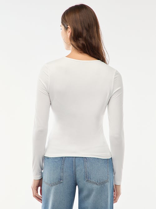 T-shirt met lange mouwen en goudkleurige sierdetail met gedraaid effect - Kiabi