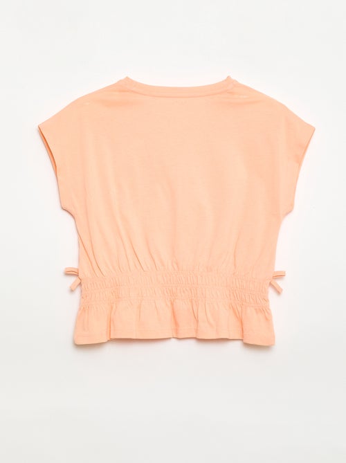 T-shirt met smocktaille en strikjes aan de taille - Kiabi