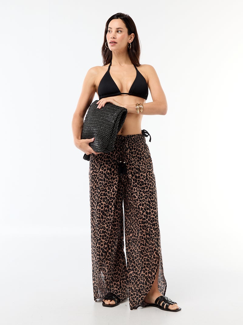 Tanga zwembroek van jerseytricot met textuur en strikbandjes Zwart - Kiabi