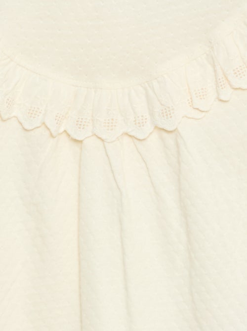 Top met lange mouw, ronde hals en halsinzet met ruches en borduursel - Kiabi