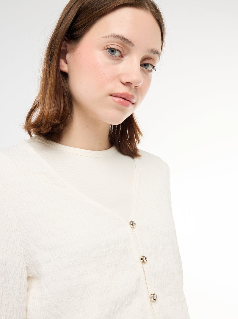 Top met V-hals van gewafelde jerseytricot met goudkleurige knopen Wit - Kiabi