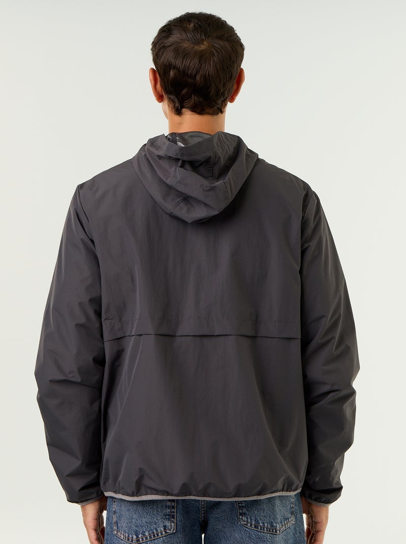Waterafstotend windjack met capuchon Zwart - Kiabi