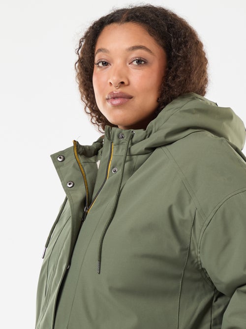 Waterafstotende parka met capuchon en imitatieschapenvacht - Kiabi