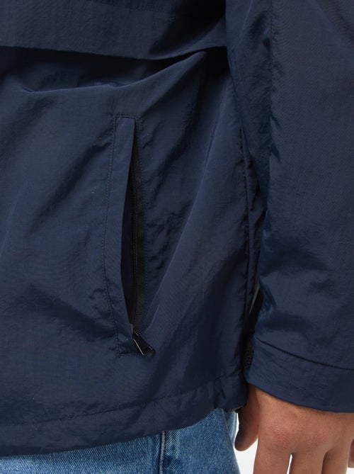 Waterdicht windjack met capuchon en afneembare mouwen - Kiabi