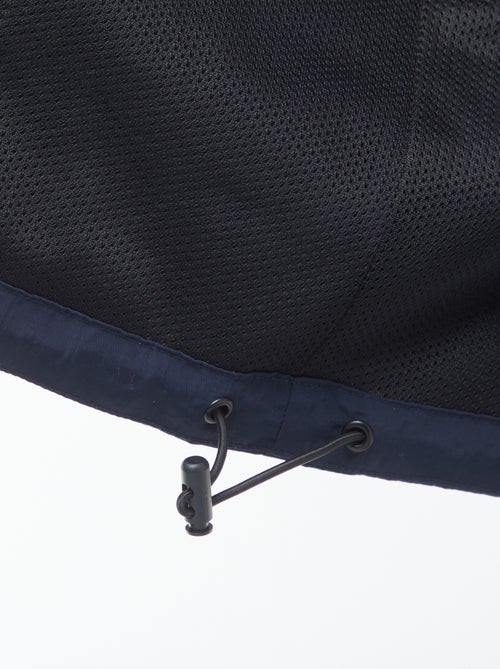 Waterdicht windjack met capuchon en afneembare mouwen - Kiabi