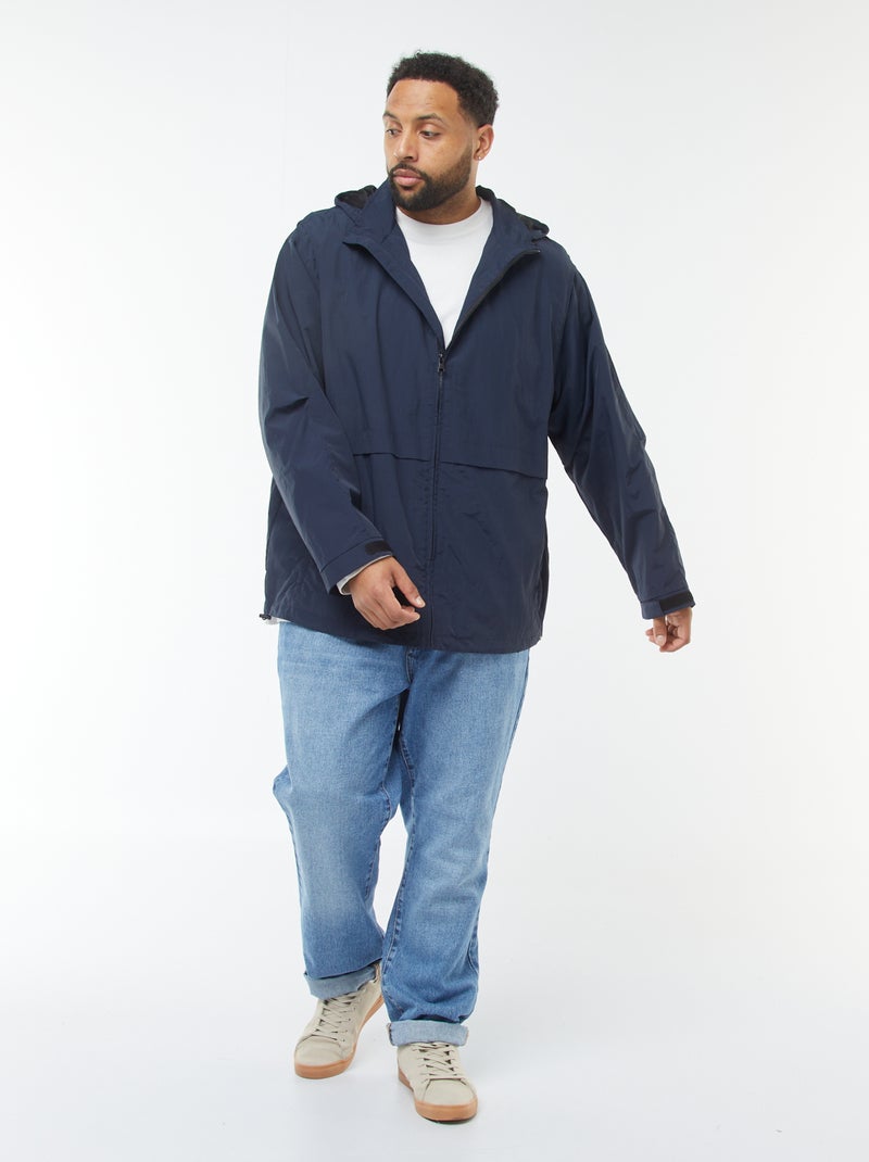 Waterdicht windjack met capuchon en afneembare mouwen Blauw - Kiabi