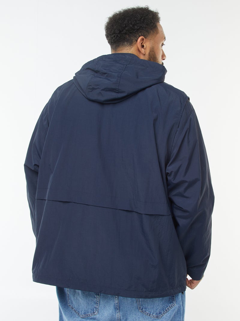 Waterdicht windjack met capuchon en afneembare mouwen Blauw - Kiabi