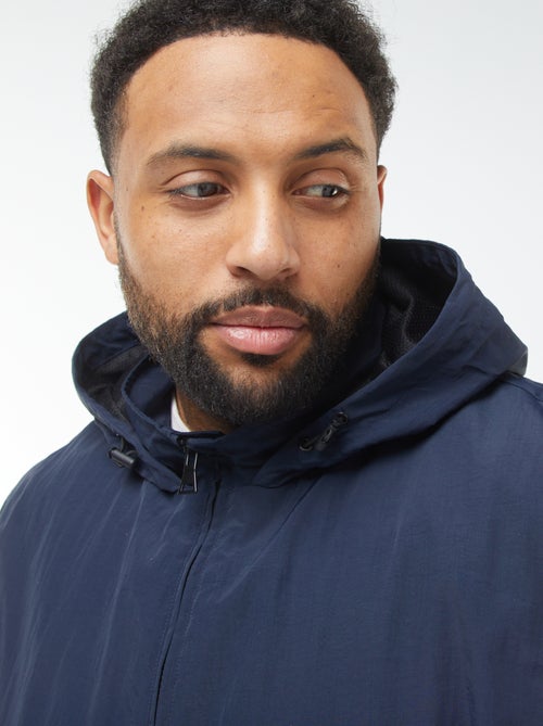 Waterdicht windjack met capuchon en afneembare mouwen - Kiabi