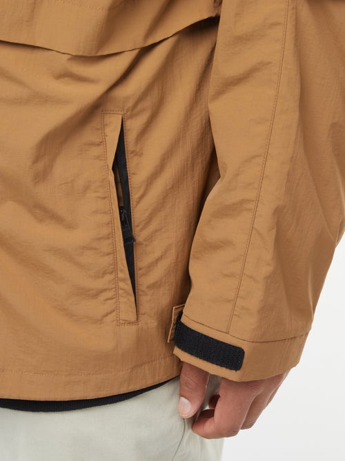 Waterdicht windjack met capuchon en afneembare mouwen - Kiabi