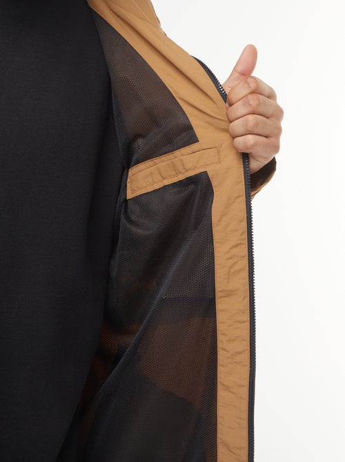 Waterdicht windjack met capuchon en afneembare mouwen - Kiabi