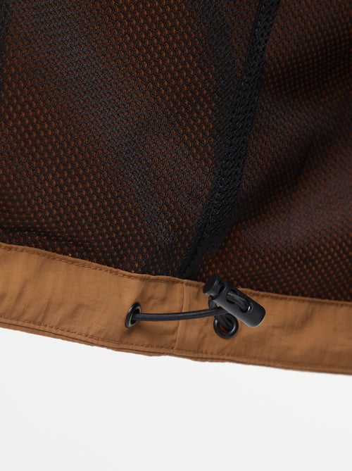 Waterdicht windjack met capuchon en afneembare mouwen - Kiabi