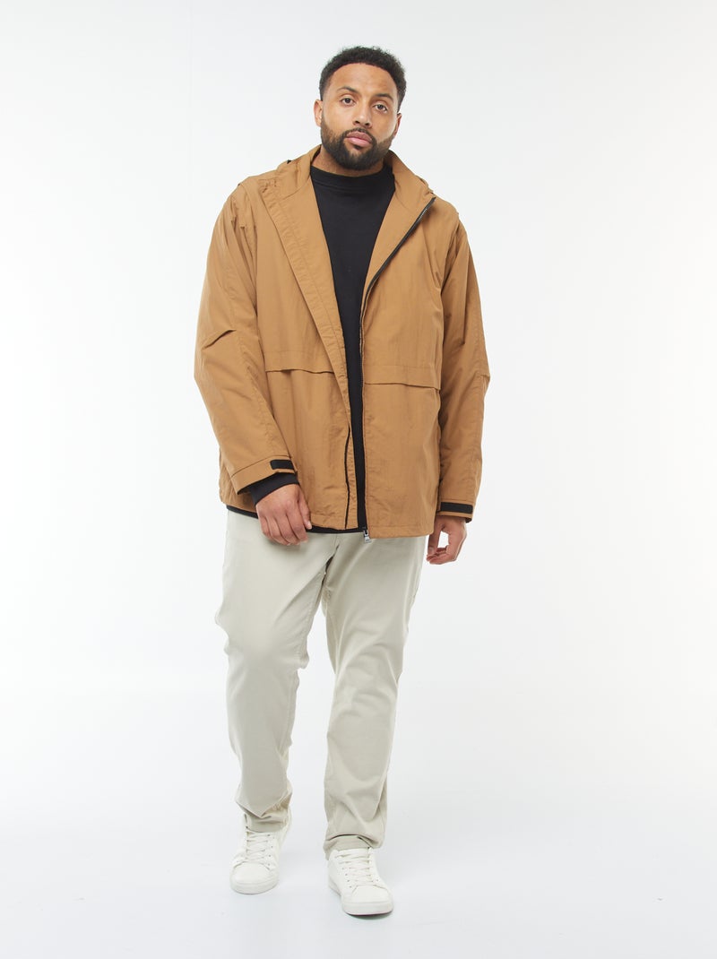 Waterdicht windjack met capuchon en afneembare mouwen Bruin - Kiabi