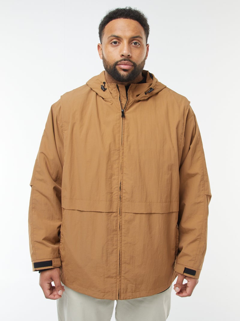 Waterdicht windjack met capuchon en afneembare mouwen Bruin - Kiabi