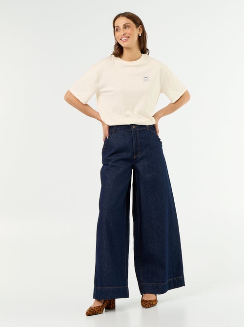 Wide leg-jeans met uitgesneden zakken - Kiabi Wide leg-jeans met uitgesneden zakken - Kiabi