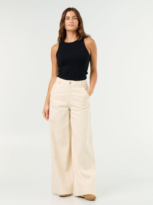 Wide leg-jeans met uitgesneden zakken - Kiabi Wide leg-jeans met uitgesneden zakken - Kiabi