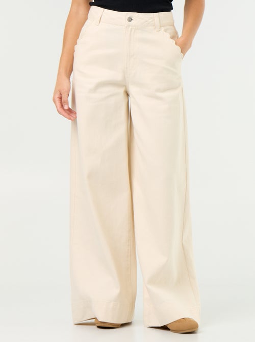 Wide leg-jeans met uitgesneden zakken - Kiabi Wide leg-jeans met uitgesneden zakken - Kiabi