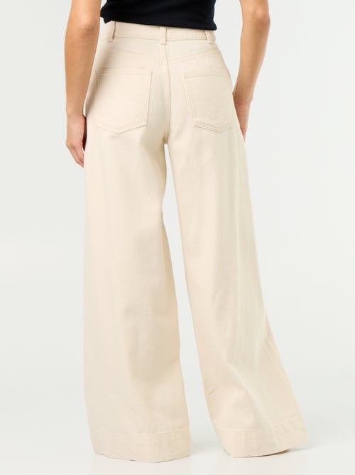 Wide leg-jeans met uitgesneden zakken - Kiabi Wide leg-jeans met uitgesneden zakken - Kiabi