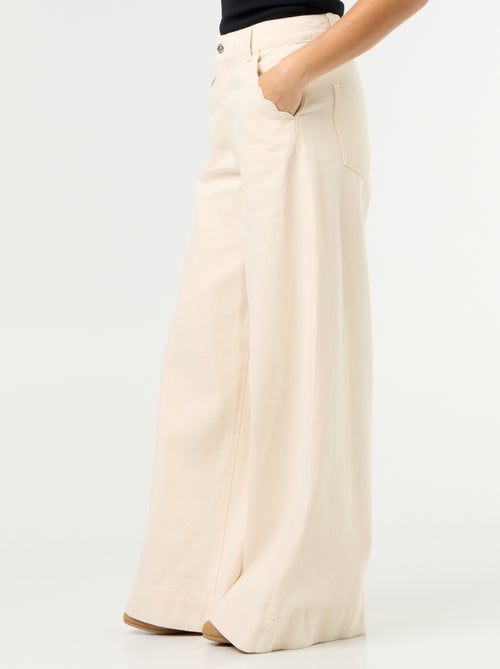 Wide leg-jeans met uitgesneden zakken - Kiabi Wide leg-jeans met uitgesneden zakken - Kiabi