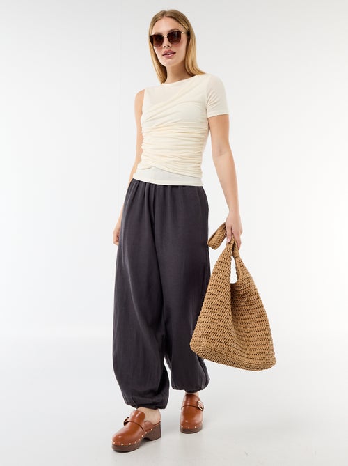Wijde broek met elastische taille en aansnoerbare onderkant - Kiabi