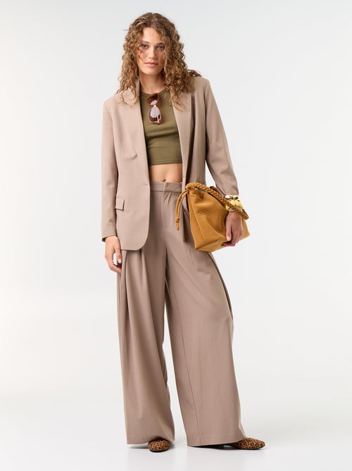 Wijde broek met hoge taille en plooien - Kiabi Wijde broek met hoge taille en plooien - Kiabi