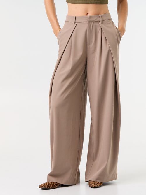 Wijde broek met hoge taille en plooien - Kiabi Wijde broek met hoge taille en plooien - Kiabi