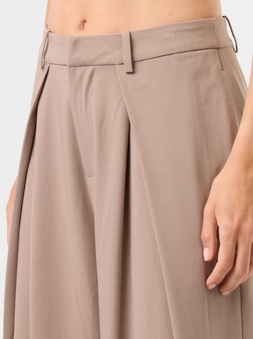 Wijde broek met hoge taille en plooien - Kiabi Wijde broek met hoge taille en plooien - Kiabi