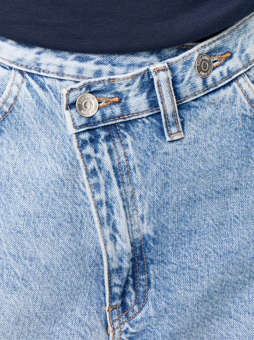 Wijde jeans met asymmetrische knoopsluiting - Kiabi
