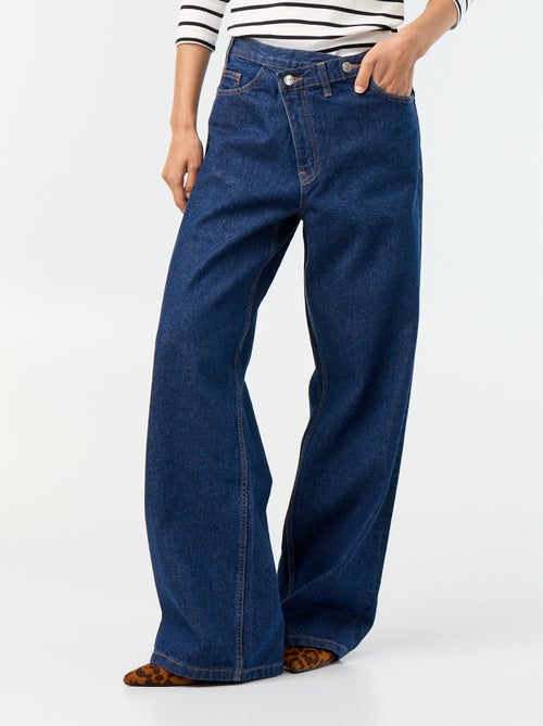 Wijde jeans met asymmetrische knoopsluiting - Kiabi Wijde jeans met asymmetrische knoopsluiting - Kiabi