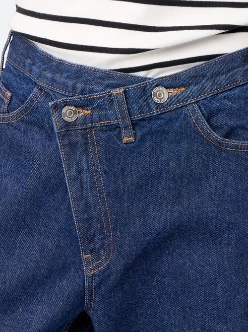 Wijde jeans met asymmetrische knoopsluiting - Kiabi Wijde jeans met asymmetrische knoopsluiting - Kiabi